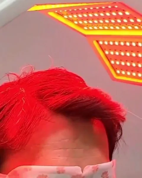 Client resting during the light step of a scalp session